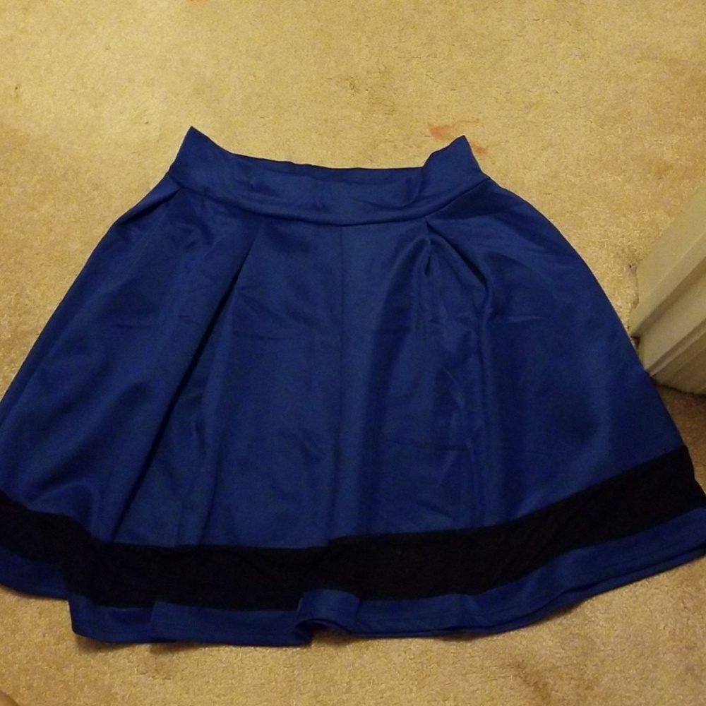 Blue, flowy skirt.